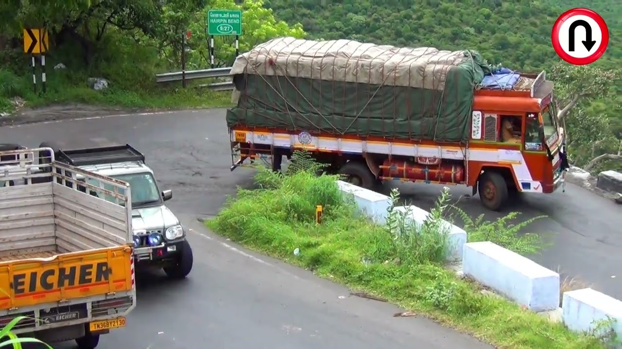 DownHill Heavy Load Truck on Full Brakes in Dhimbam Mountain Bends