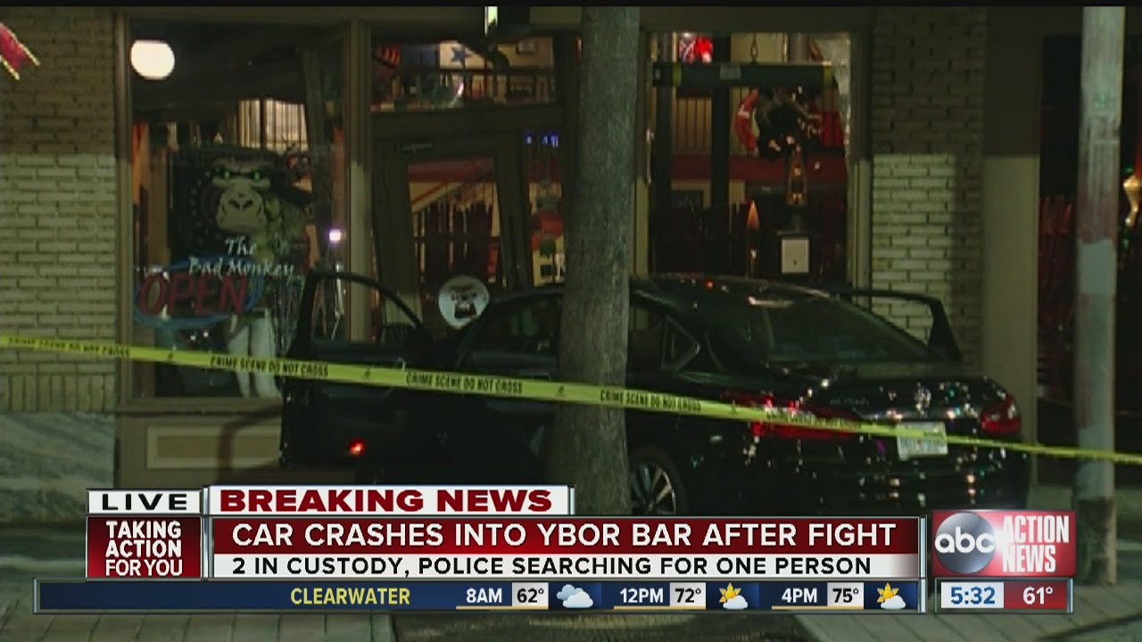 Car crashes into Ybor City bar after fight, police searching for driver
