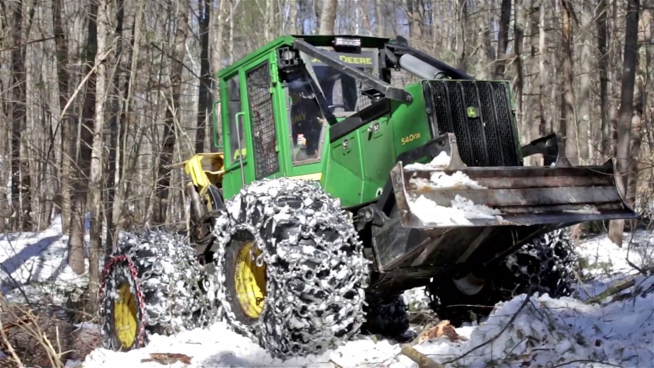 John Deere 540GIII Working Hard in The Snow