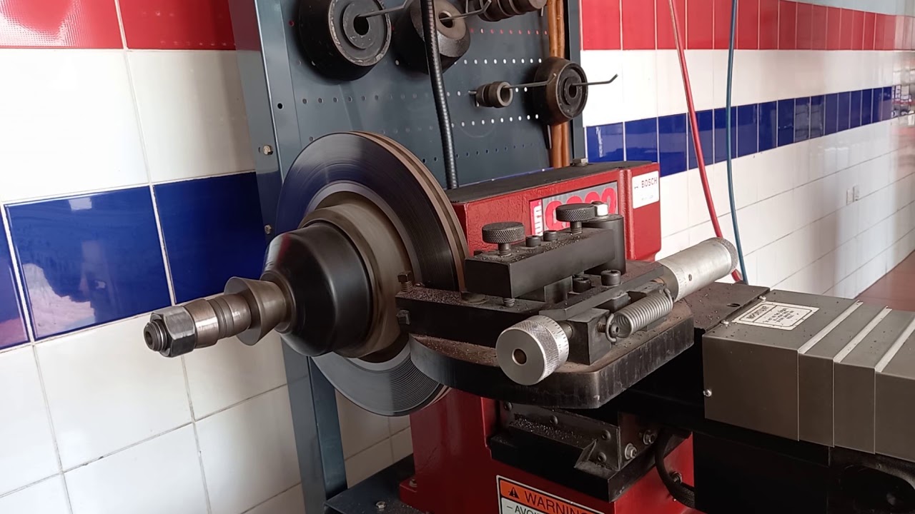 3rd(vlog)how to replace brake pads Nissan altima with rotor disc reface using (Bosch Lathe machine)