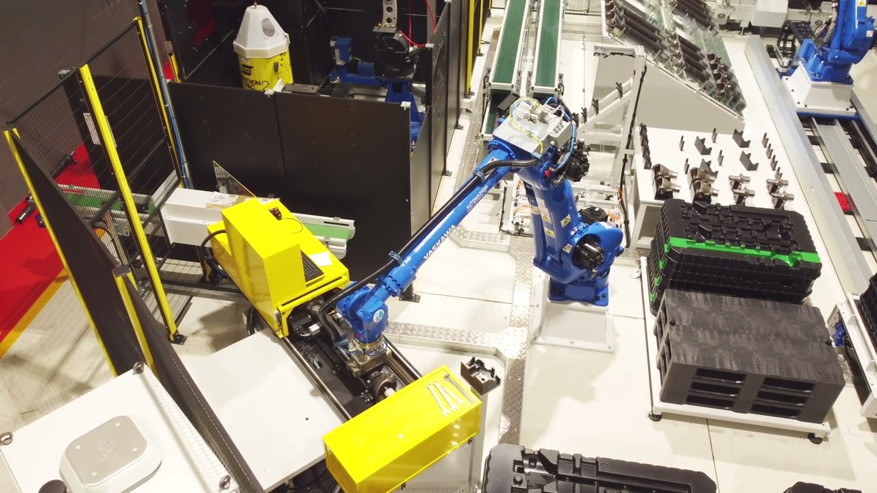 Automazione per carico/scarico torni - lavorazione componenti per veicoli industriali