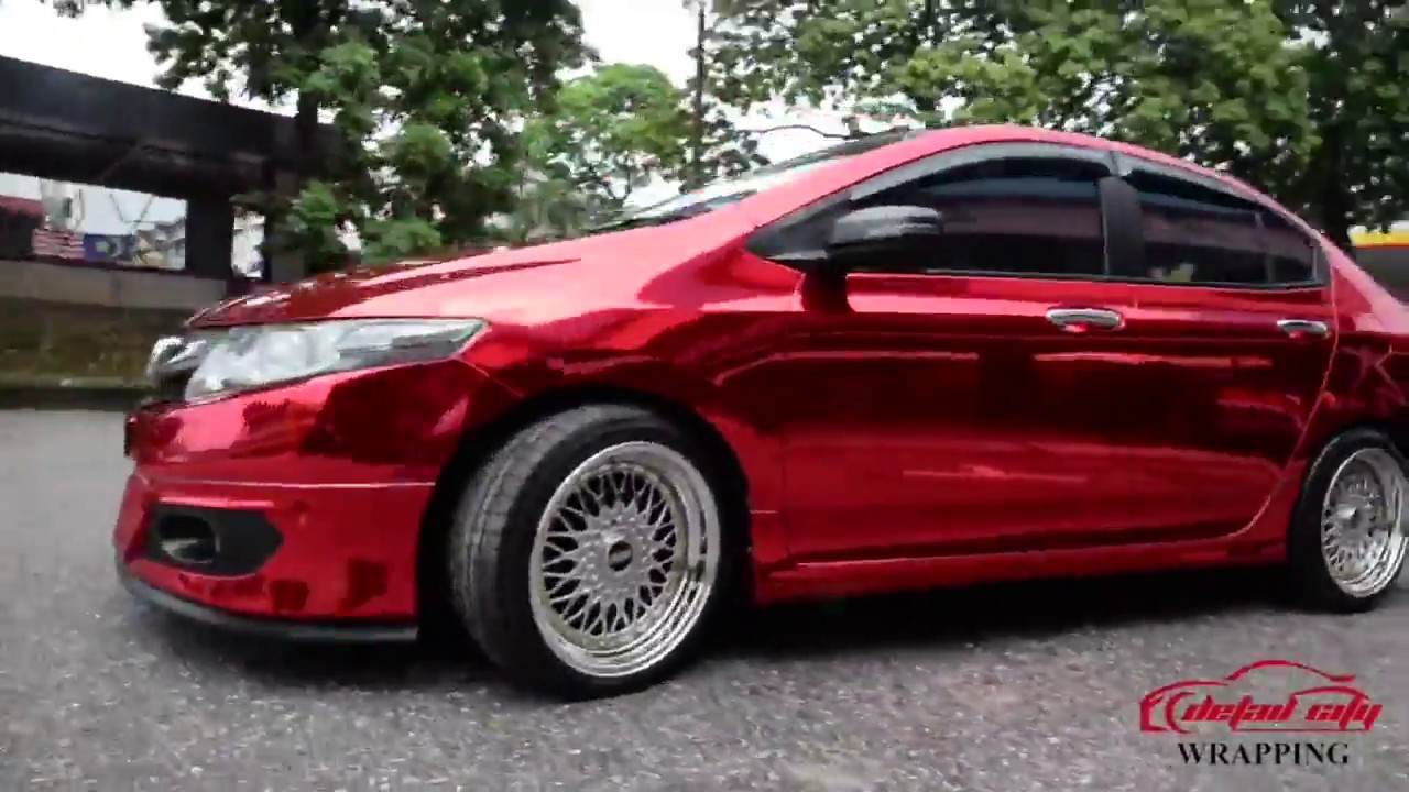 HONDA CITY WRAPPED IN RED CHROME