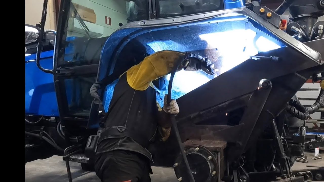 Valtra crane attachment reinforcement. English subtitles. Part 2/2