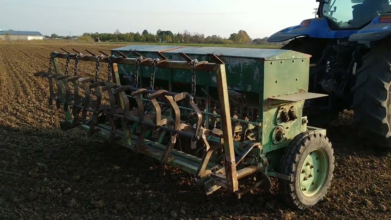 σπορα σιταριου με τρακτερ New Holland TS115A