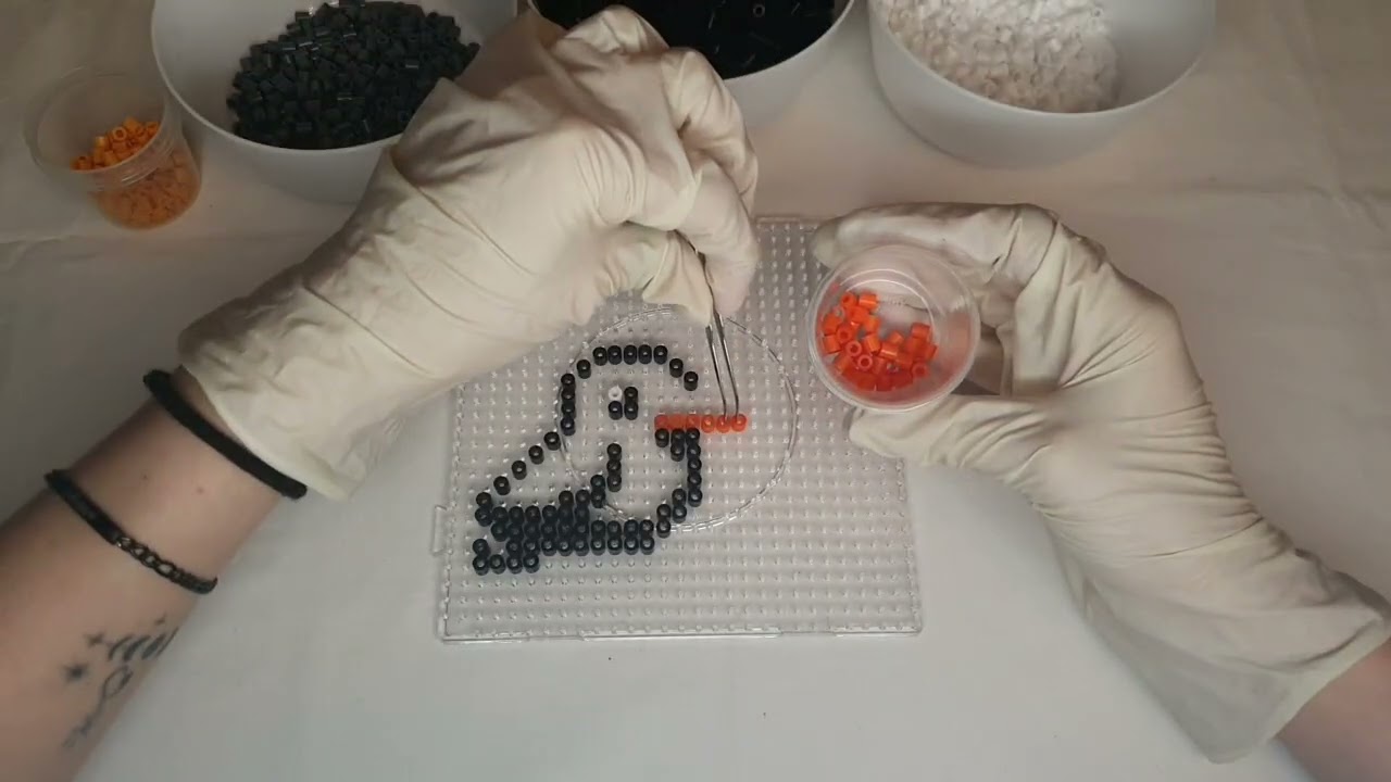 Create an iron-on bead picture with latex gloves ASMR little black bird #asmr 