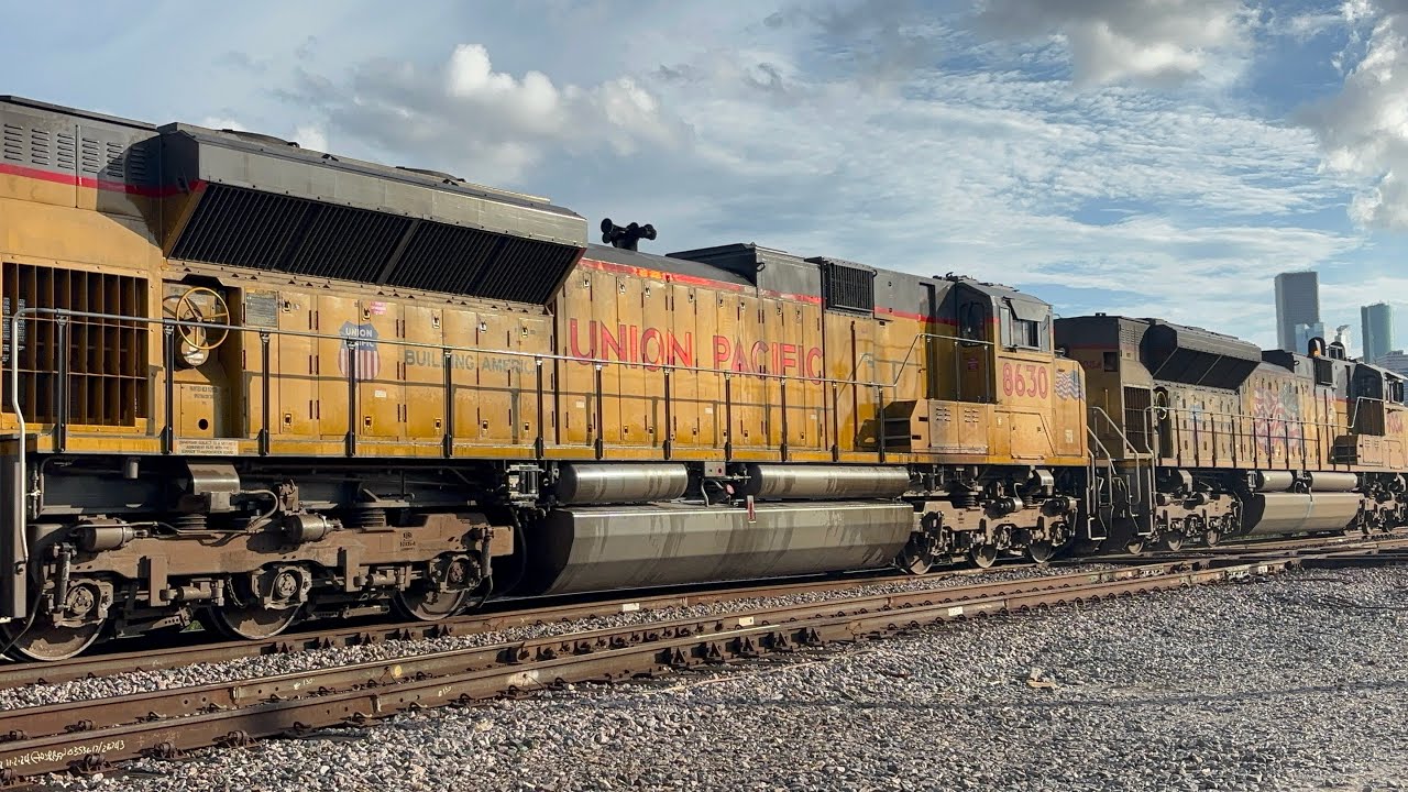 UP 9084 and UP 8630 Westbound empty load rock train