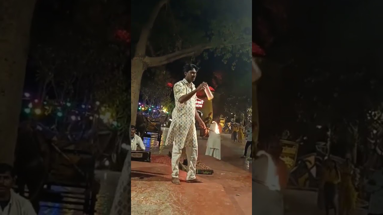 Mesmerizing fire dance at night! Witness the heat and rhythm in every move. 🔥✨ 