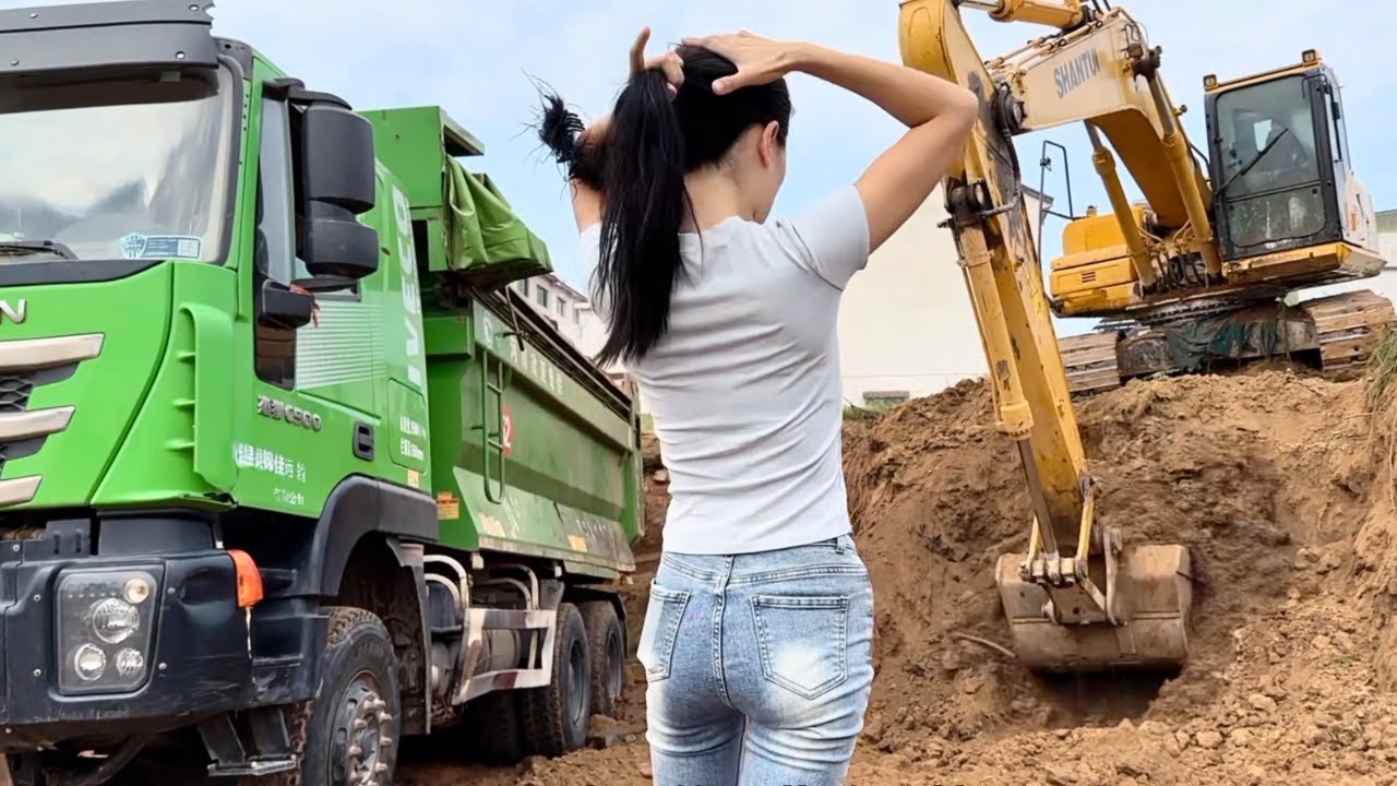 Женщина-водитель грузовика Даён усердно трудится, управляя грузовиками и собирая кукурузу на полях.