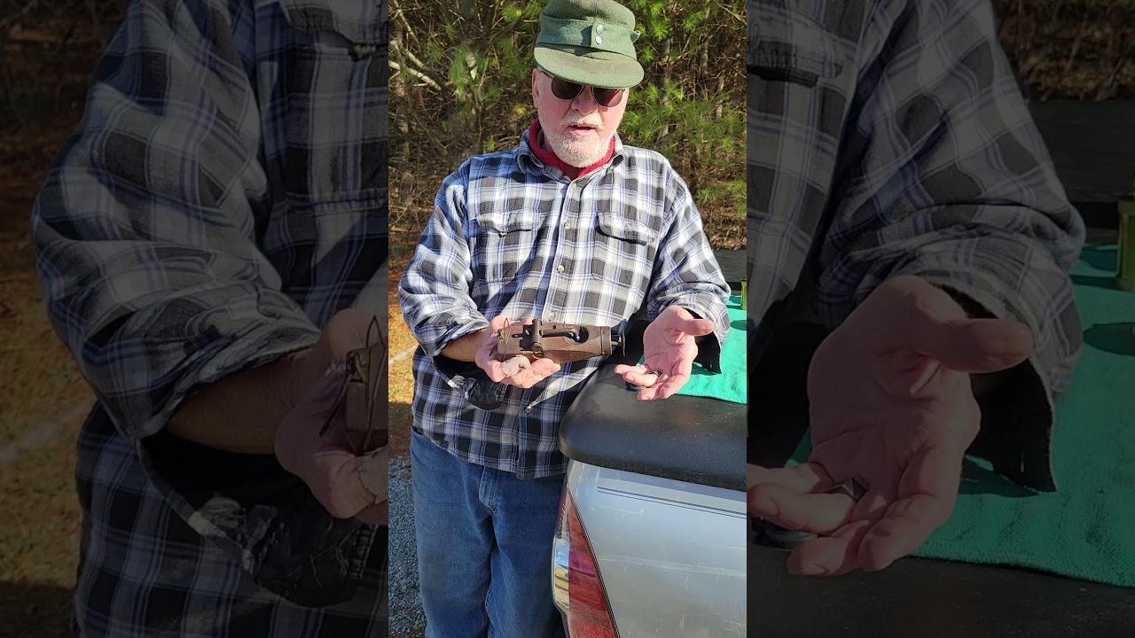 a percussion type mole trap