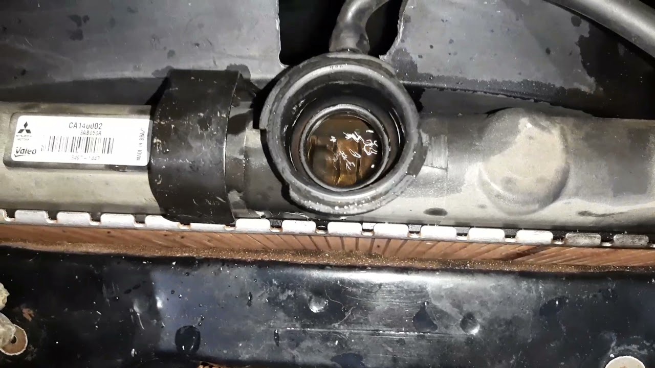 MITSUBISHI 2 PARTE VIDEO L200 JOGANDO AGUA FORA E AQUECENDO MOTOR 