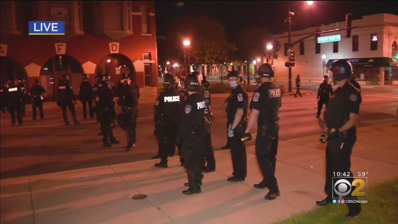 Police Advance As Protests Turn Violent In Aurora