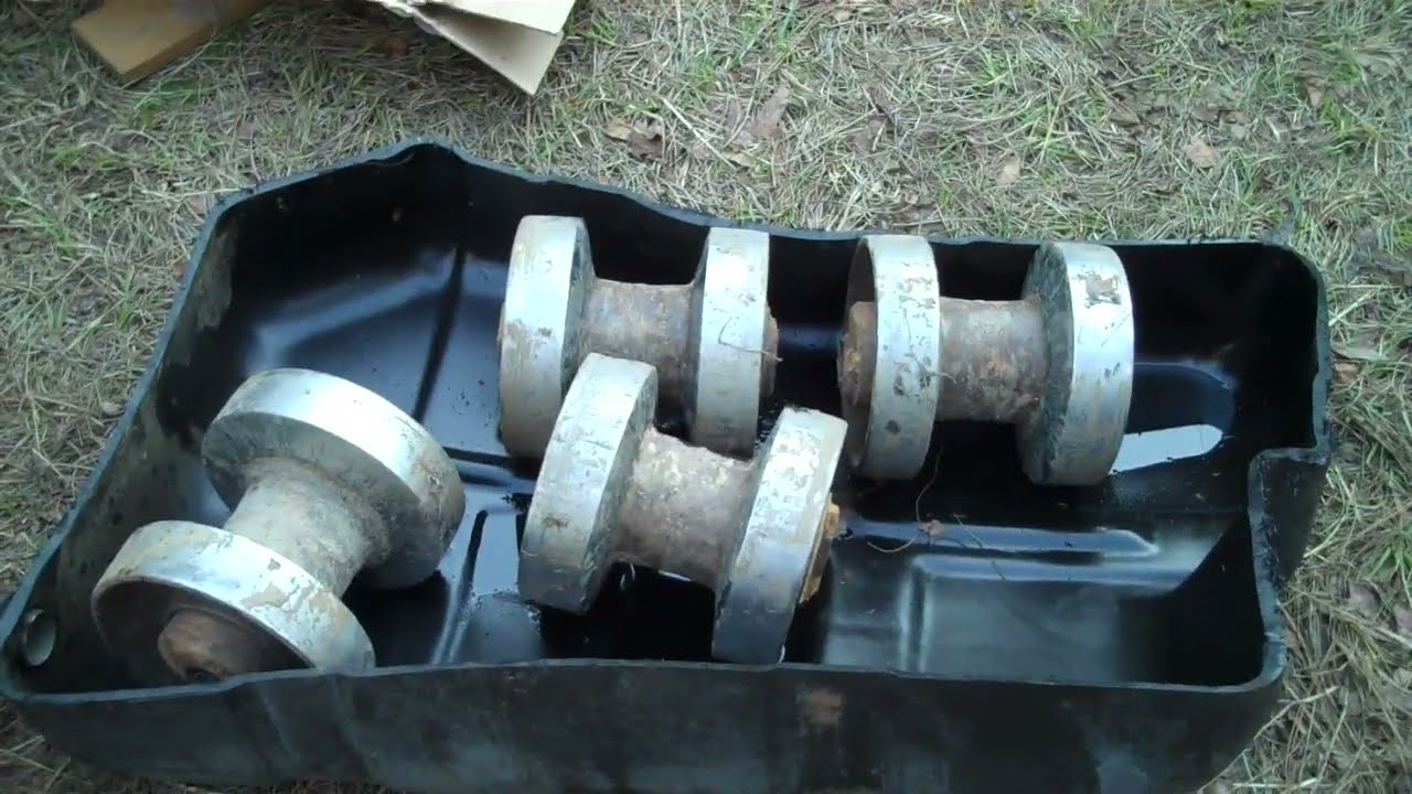 Takeuchi TL12 - rollers/idlers gear oil change instructions