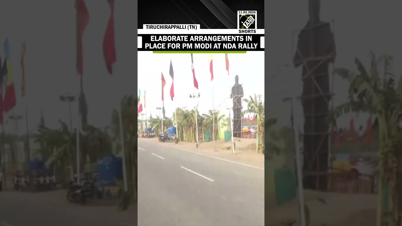 Hoardings of PM Modi line the roads ahead of his appearance at the NDA public rally