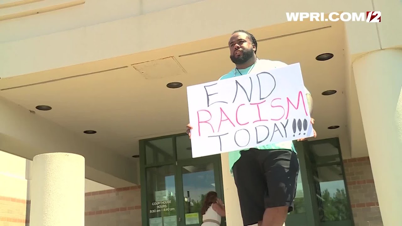 VIDEO NOW: South Kingstown resident Marcus Robinson protests outside the Longo trial