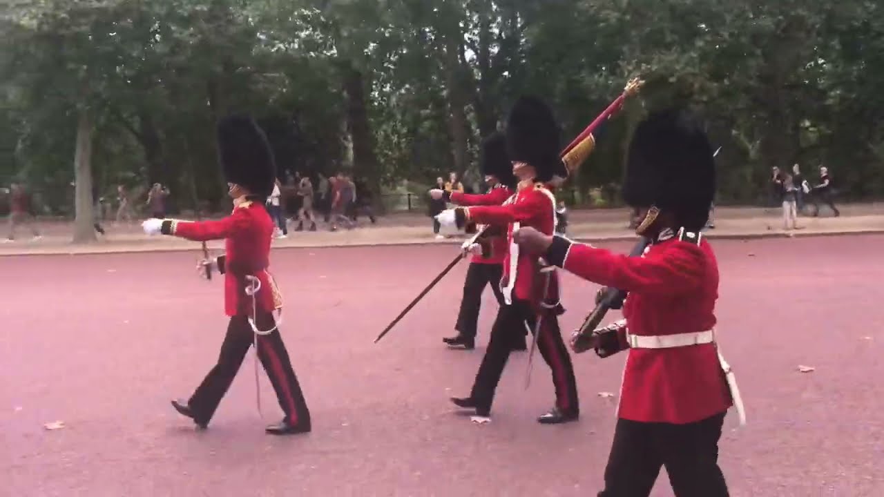 Band of the welsh guards and F company Scots guards full march back to ST James’s palace