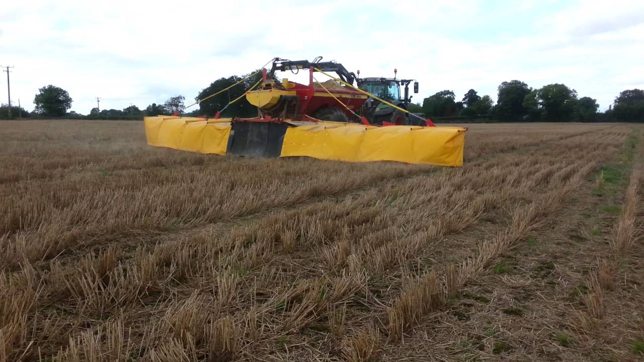 Dustless lime speader with curtain booms
