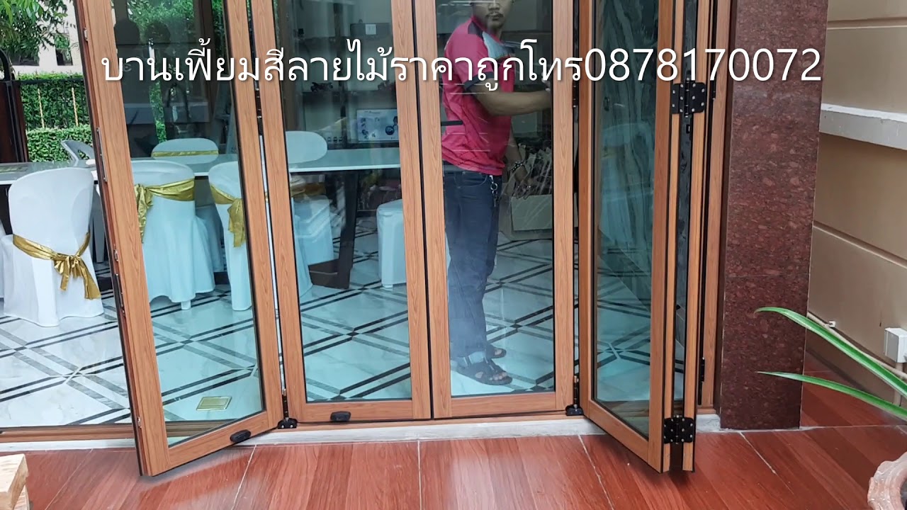 ประตูบานเฟี้ยม สีลายไม้ ร้านช่างบูรณ์  0815616609