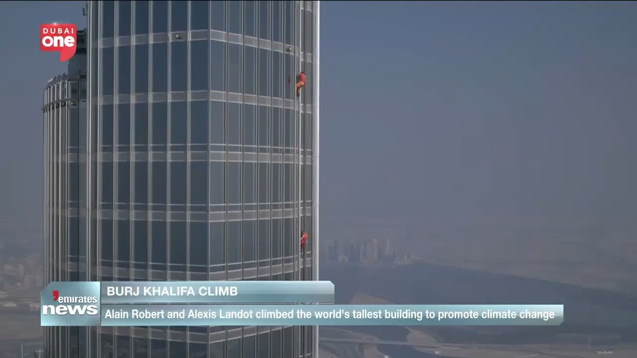 Alain Robert And Alexis Landot climbed the world's tallest building to promote climate change