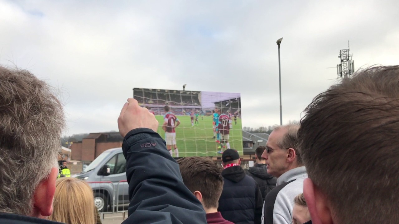Lincoln City fans celebrate FA Cup Goal against Burnley at Sincil Bank