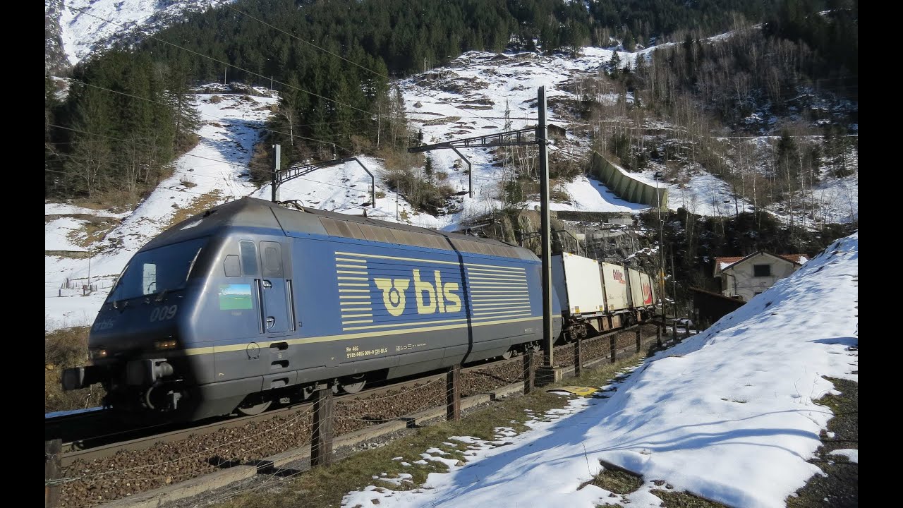 Züge auf der Gotthard-Eisenbahn März 2014 mit Re 460 Coop Werbelok - Zug, trainfart, train