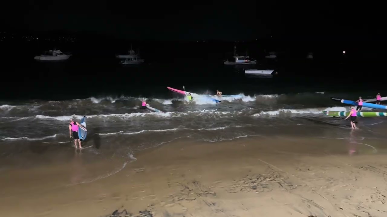 ‘Night’ training. Wamberal Beach Surf Club paddlers in the dark before sunrise. 