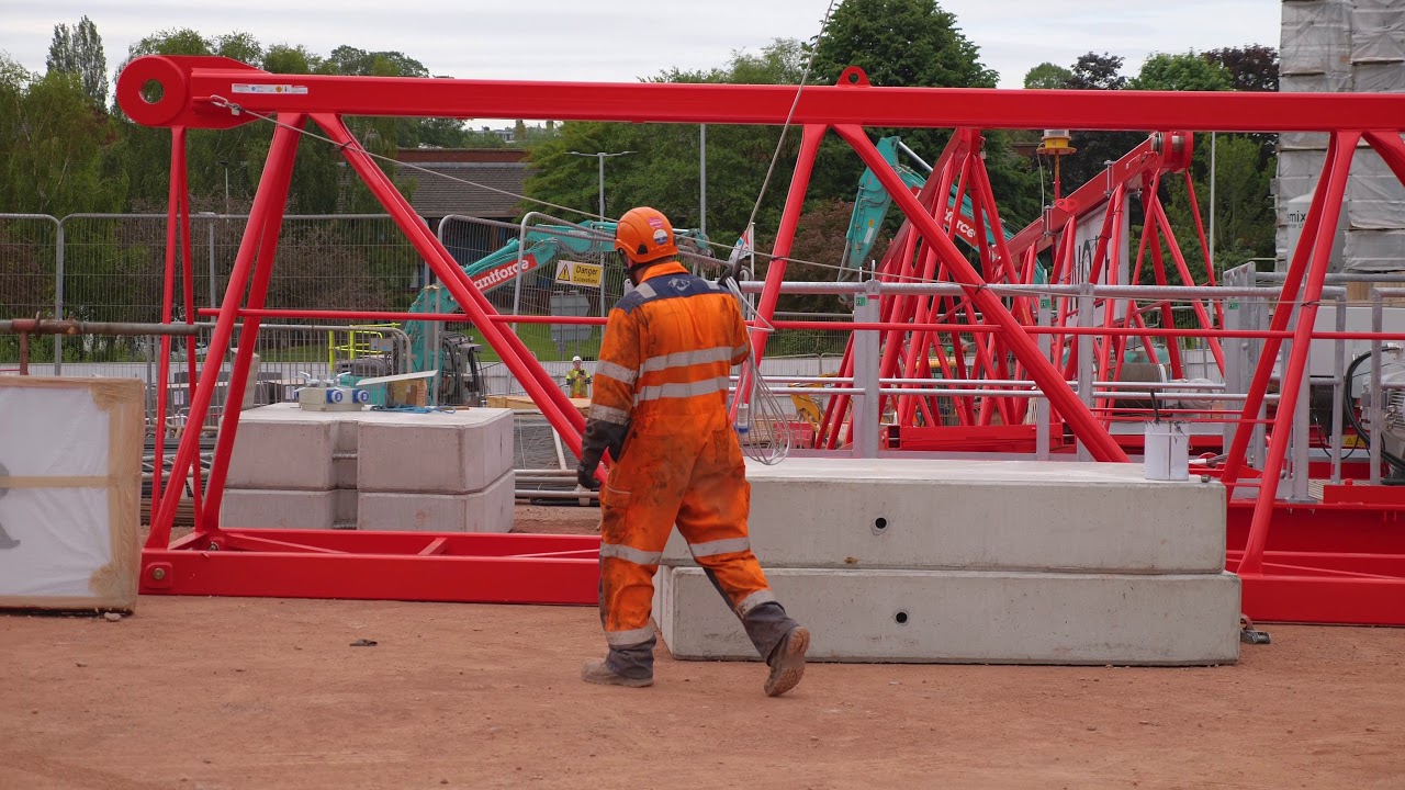 Assembling WOLFF biggest flat top tower crane the WK7534 clear