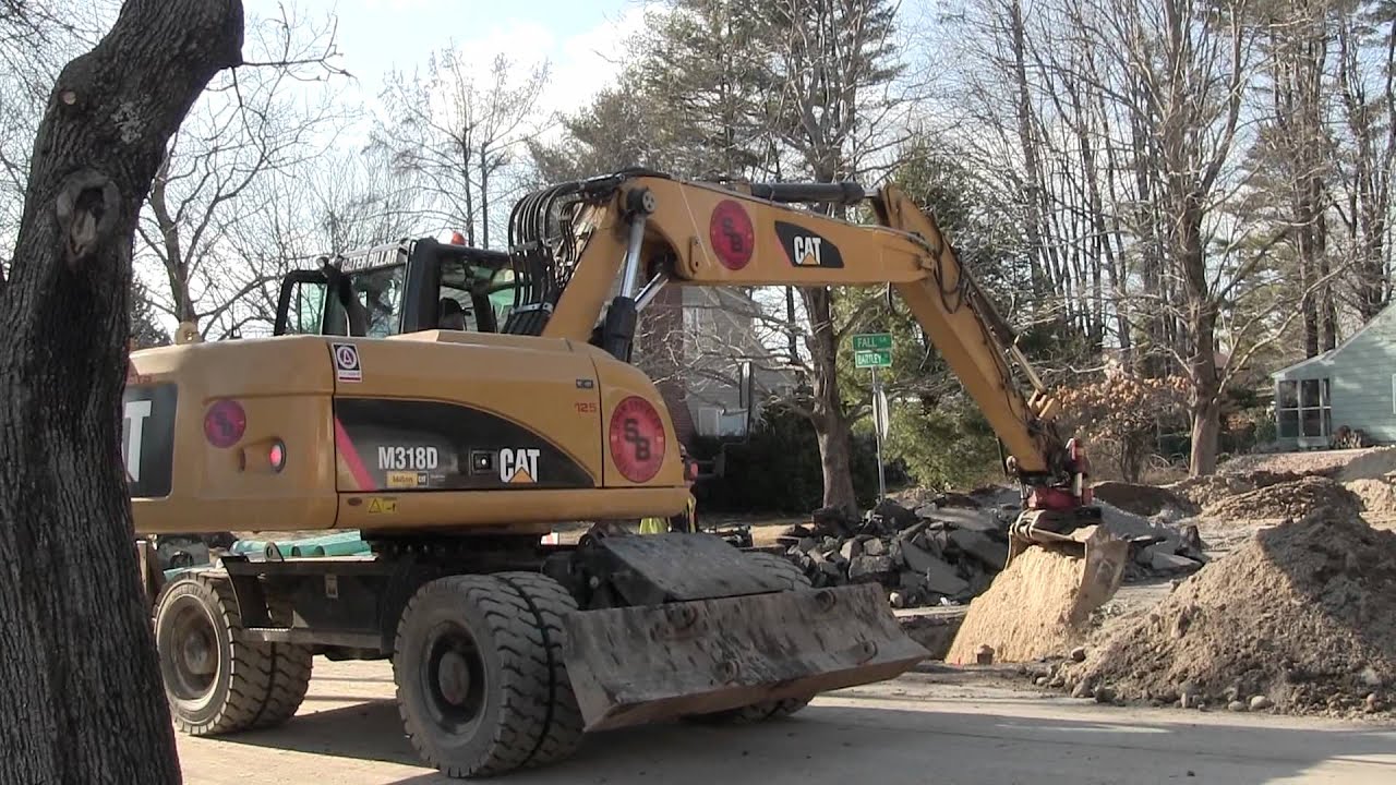 Cat M318D Working More