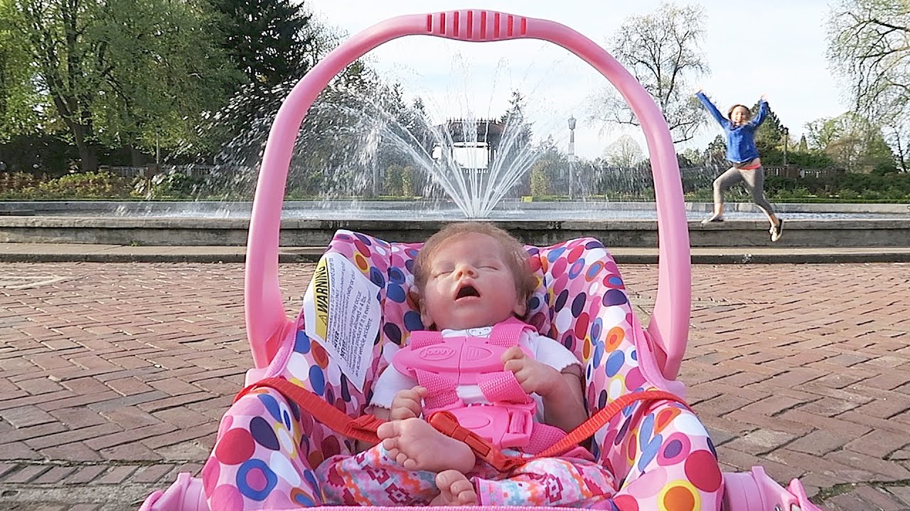 Reborn Baby Doll at the Park in Joovy Doll Stroller