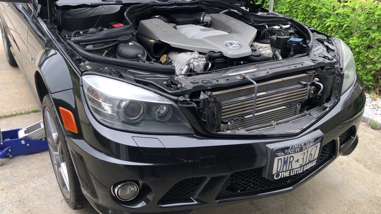 Removing the front bumper of a Mercedes C63 W204, the headlight lenses,  lower grill, replacing them