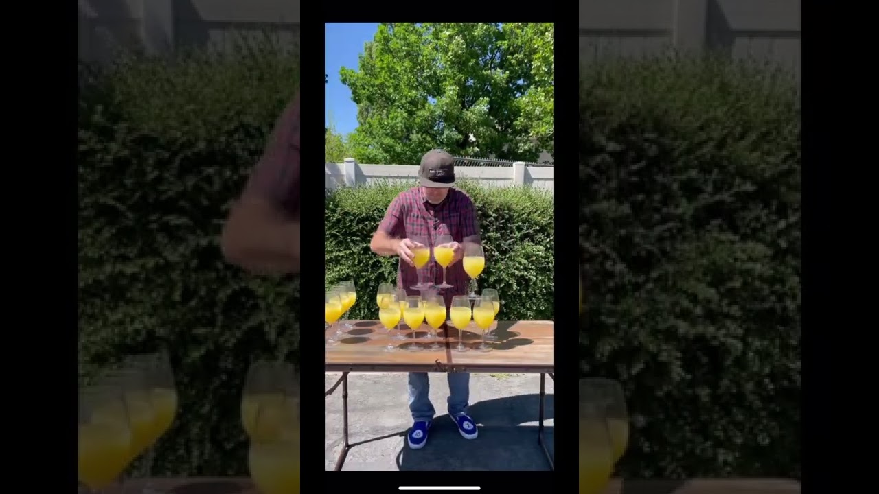 Glass stacking gone bad!!! #reverse #glassstacking #oj #orangejuice #shorts