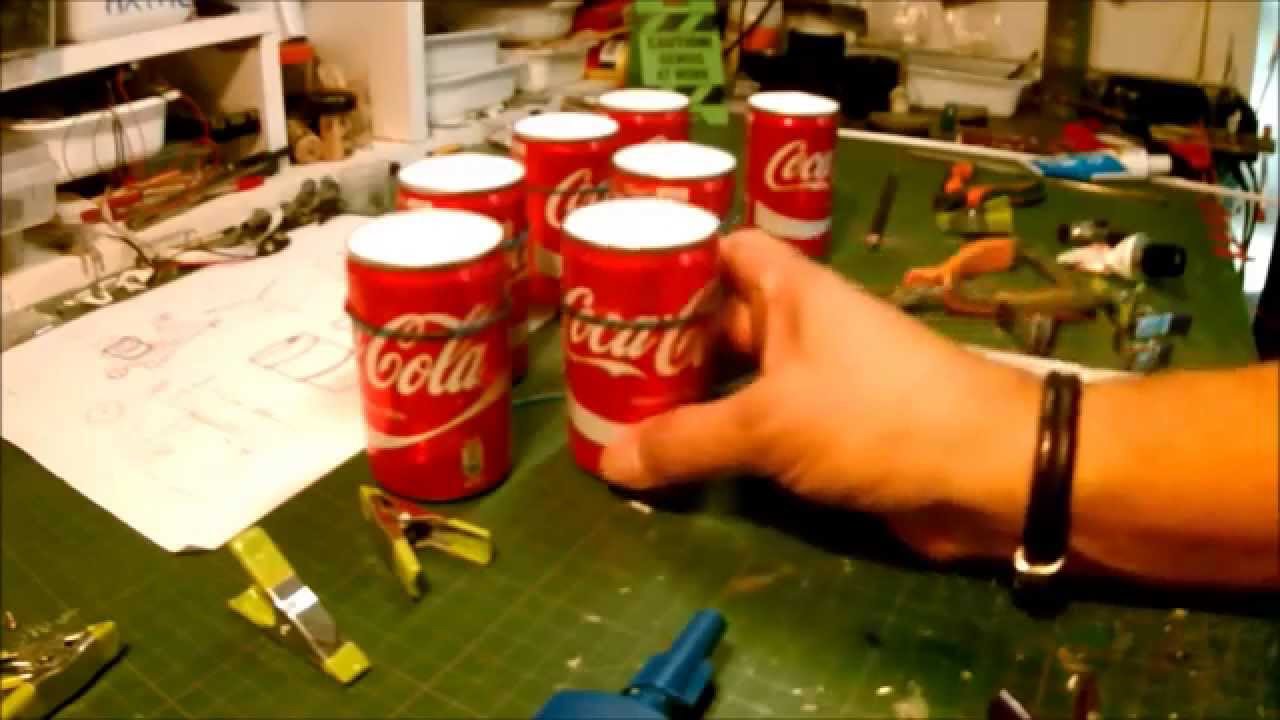 BUILT BARRELS OF OIL WITH BOXES OF COCA COLA FOR THE GARAGE/DIORAMA