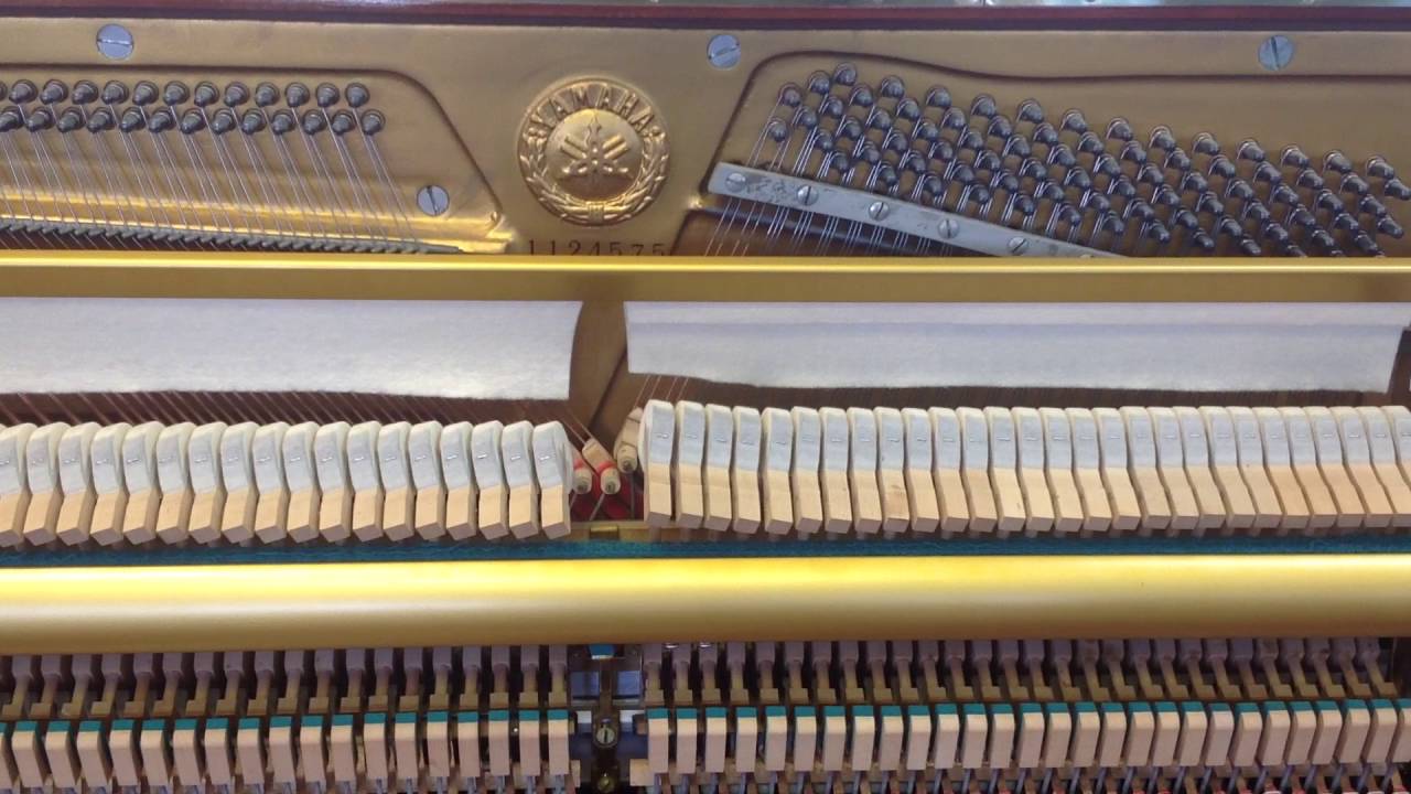 How to remove a front panel on an upright piano