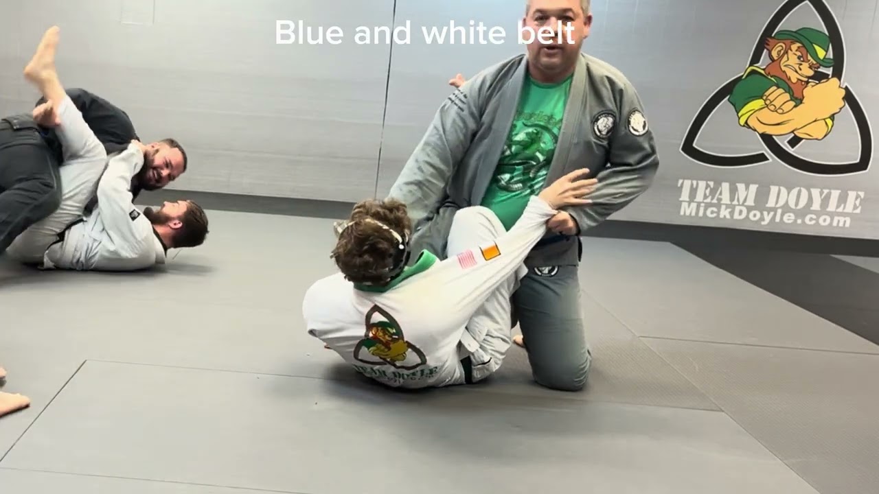 Blue belts, white belt and kid roll
