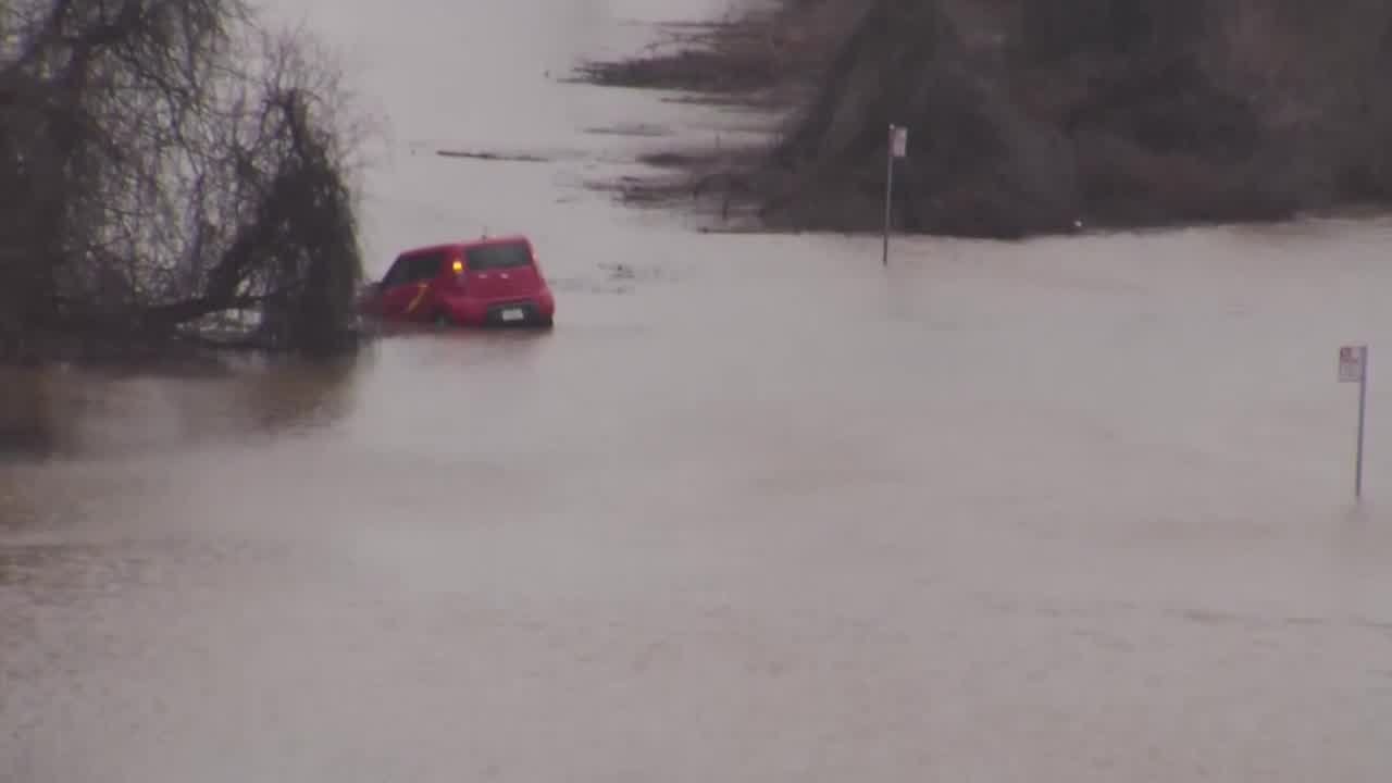 Man Drives Around Closure, Gets Car Stuck In Flooded North Sacramento Road
