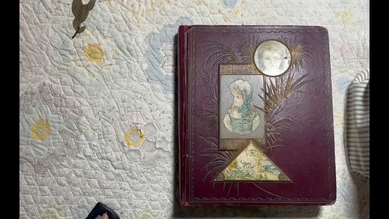 Gigantic junk journal from an antique scrapbook cover