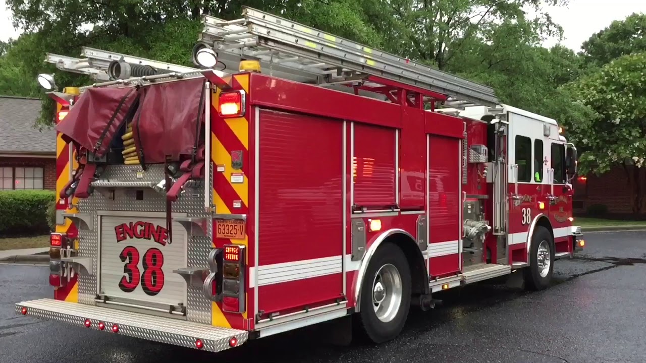 Charlotte Fire Department brings out a box as multiple trucks respond to a possible structure fire