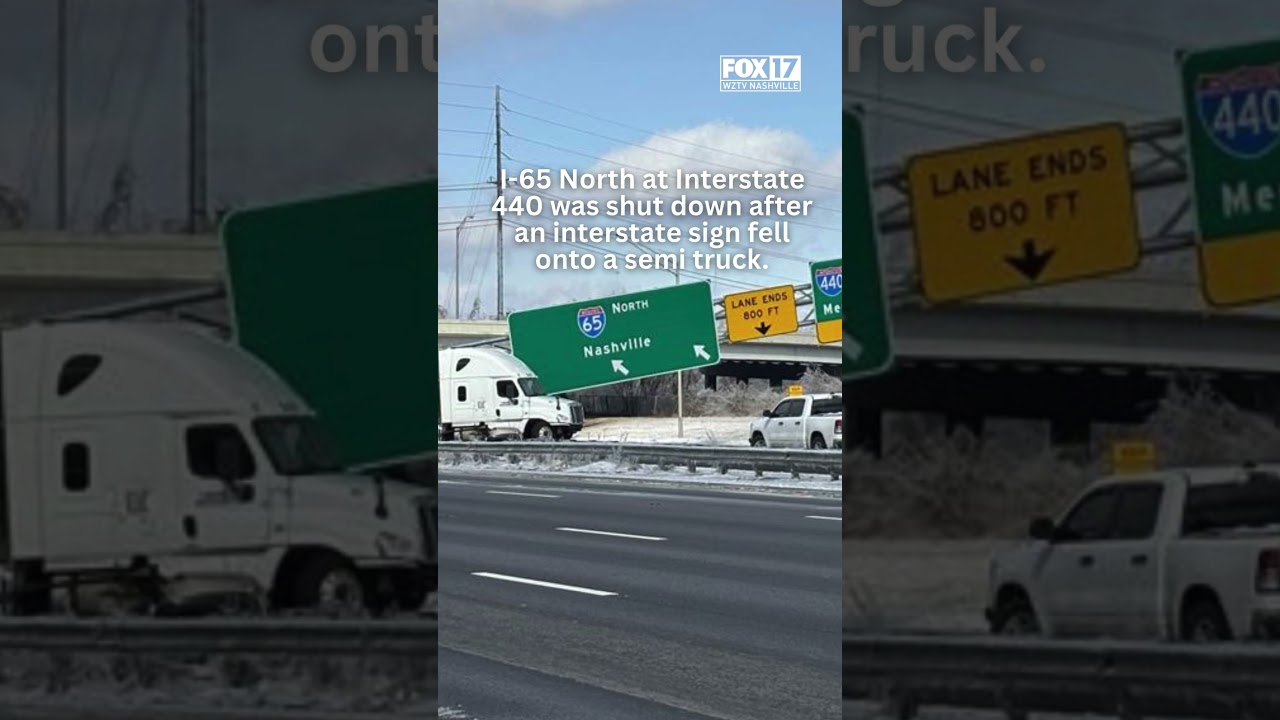 Interstate sign back up after falling on semi