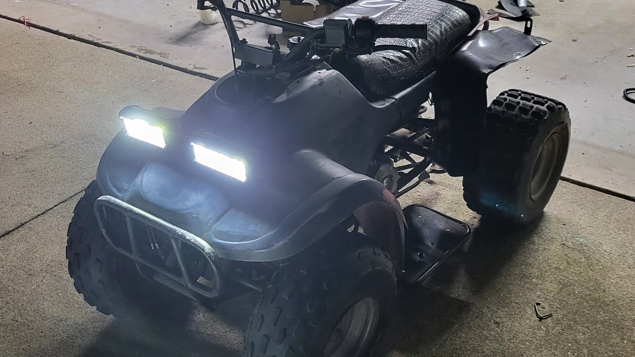 $150.00 ATV gets rear fender supports, rubber liners, and headlights