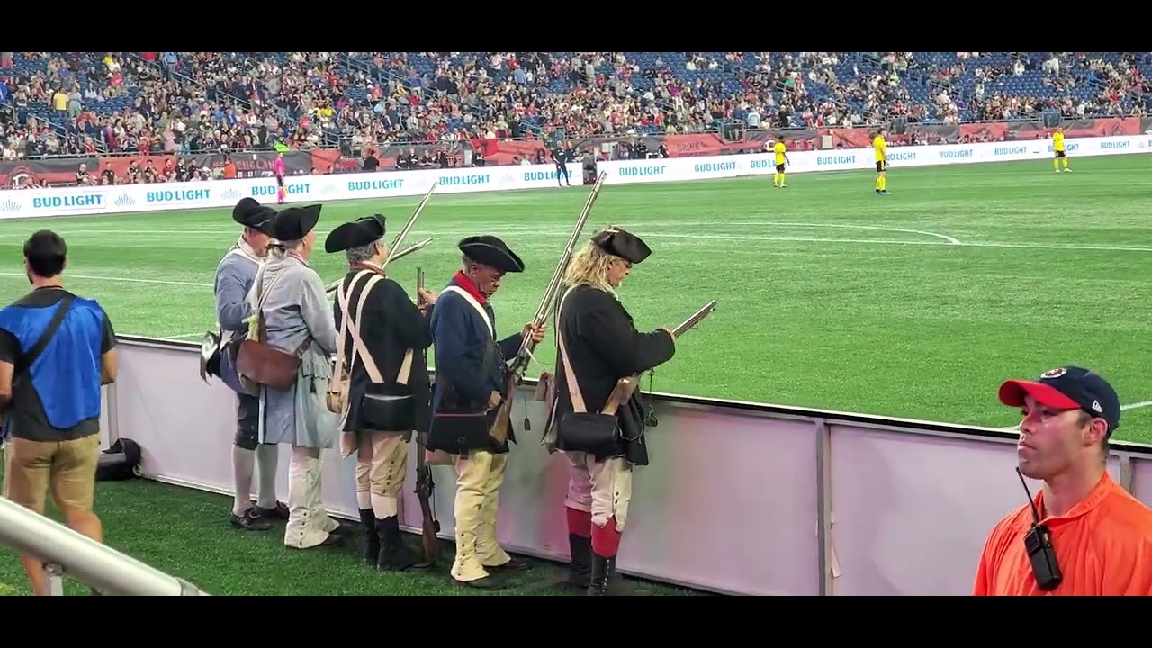 The New England Revolution End Zone Militia firing the muskets at the Revolution Soccer game