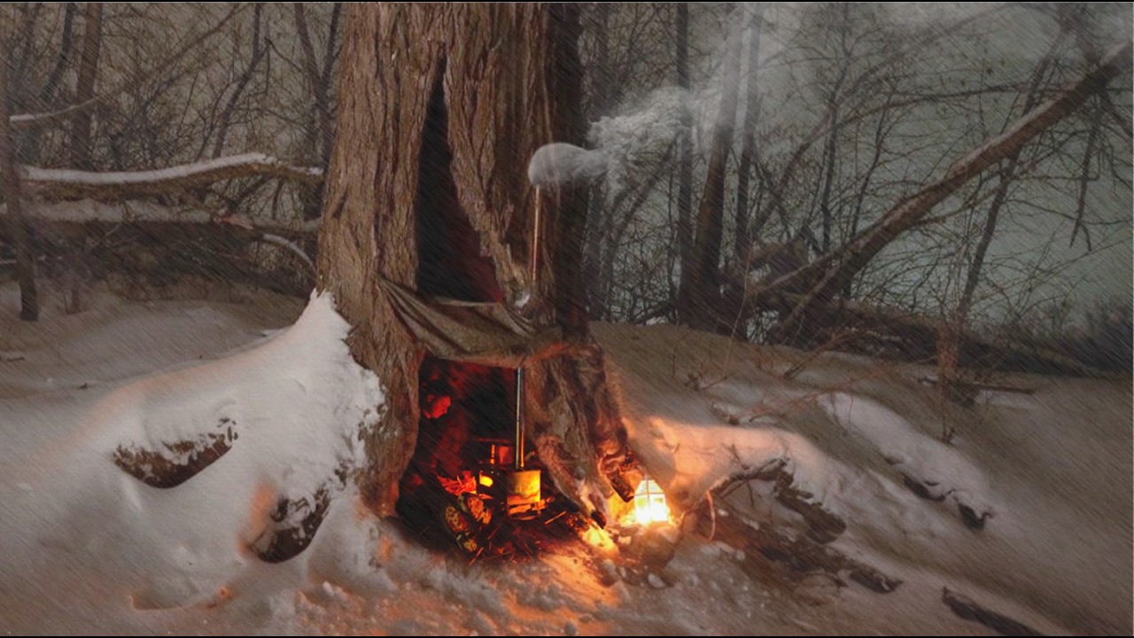 Extreme survival in a hollow tree in winter | Primitive fire-making, fishing and cooking