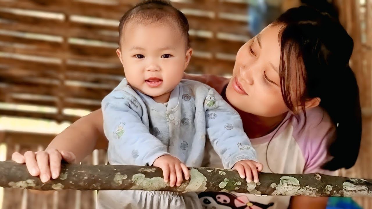 The Happy Eyes of a Mother Watching Her Baby Begin to Explore the World
