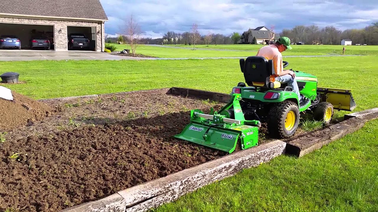 Tilling with John Deere X758 and Frontier 42