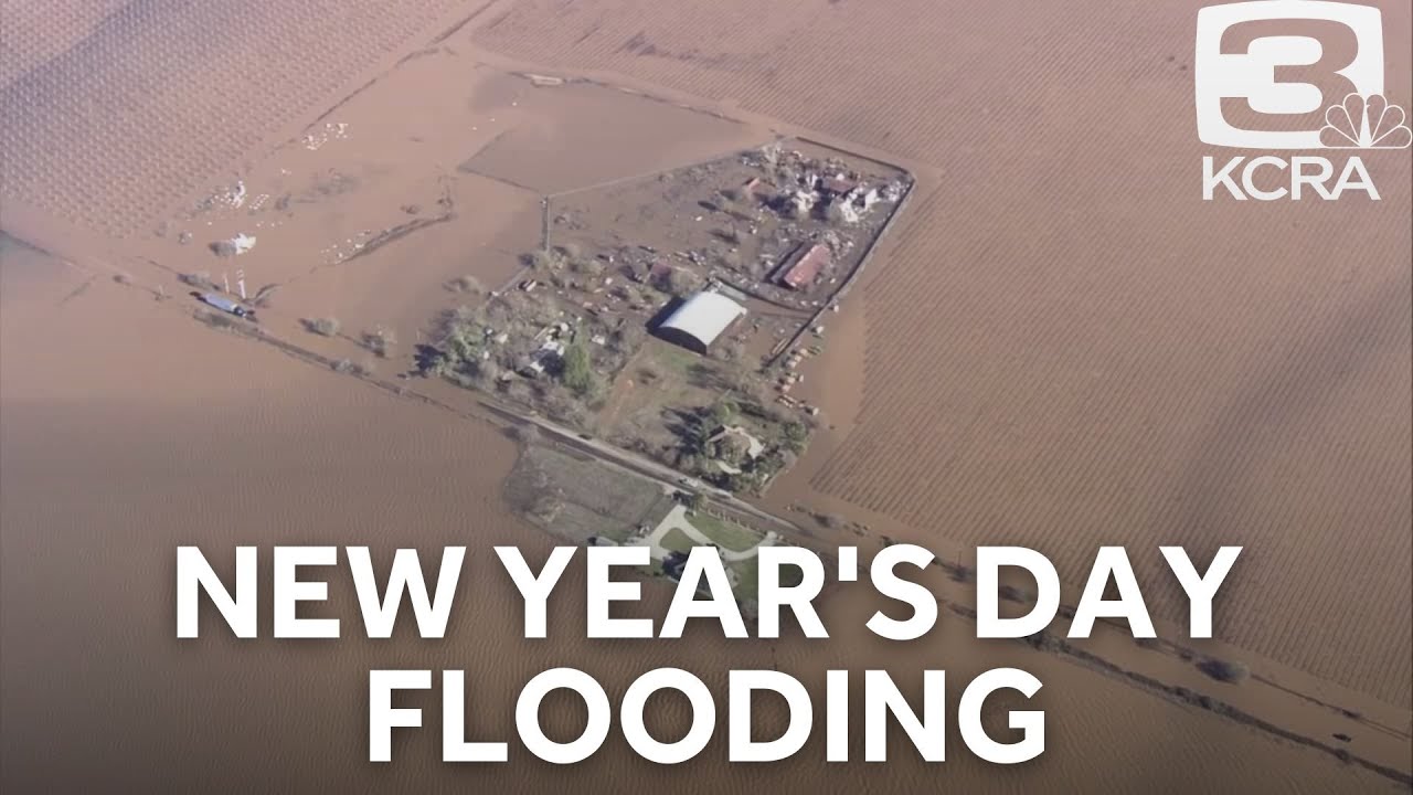 Chief Meteorologist Mark Finan surveys floodwaters in Sacramento County
