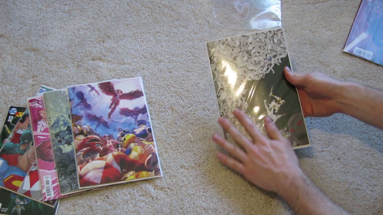 Comic Books - plastic sleeves and binder pages ASMR