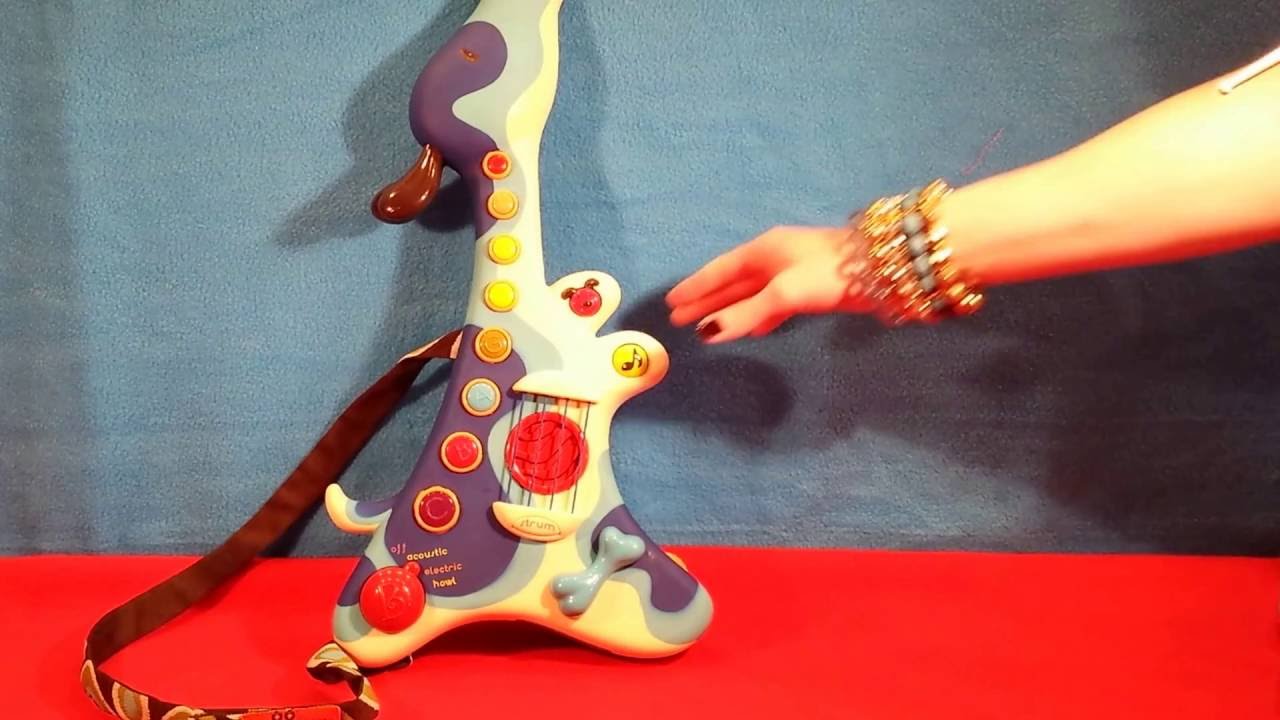 Woofer hound dog musical toy guitar by B toys