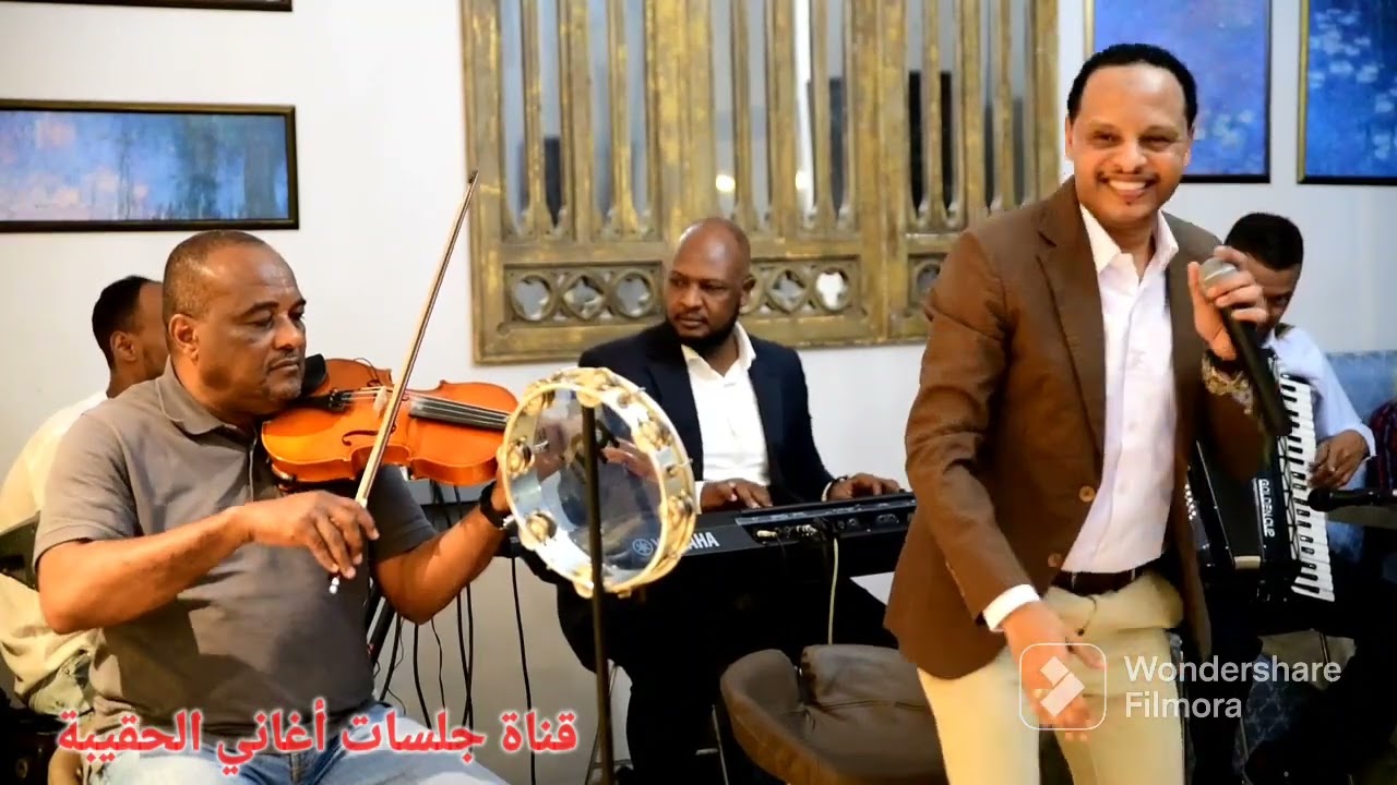 زهـرة السوسن ..  والنجم اللامع الفنان الأستاذ حسـن محجـوب ❤️❤️
