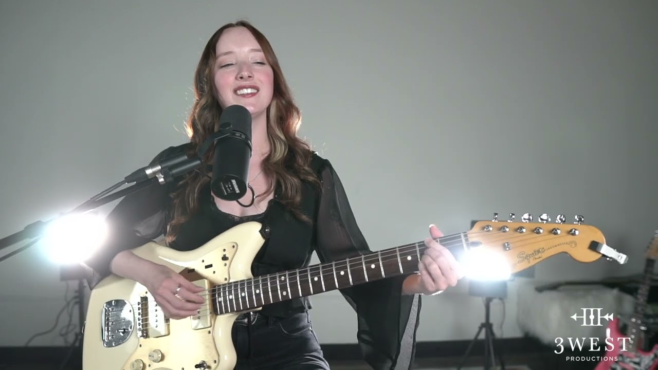 Guitar + Vocals (Nicole Zell) - 