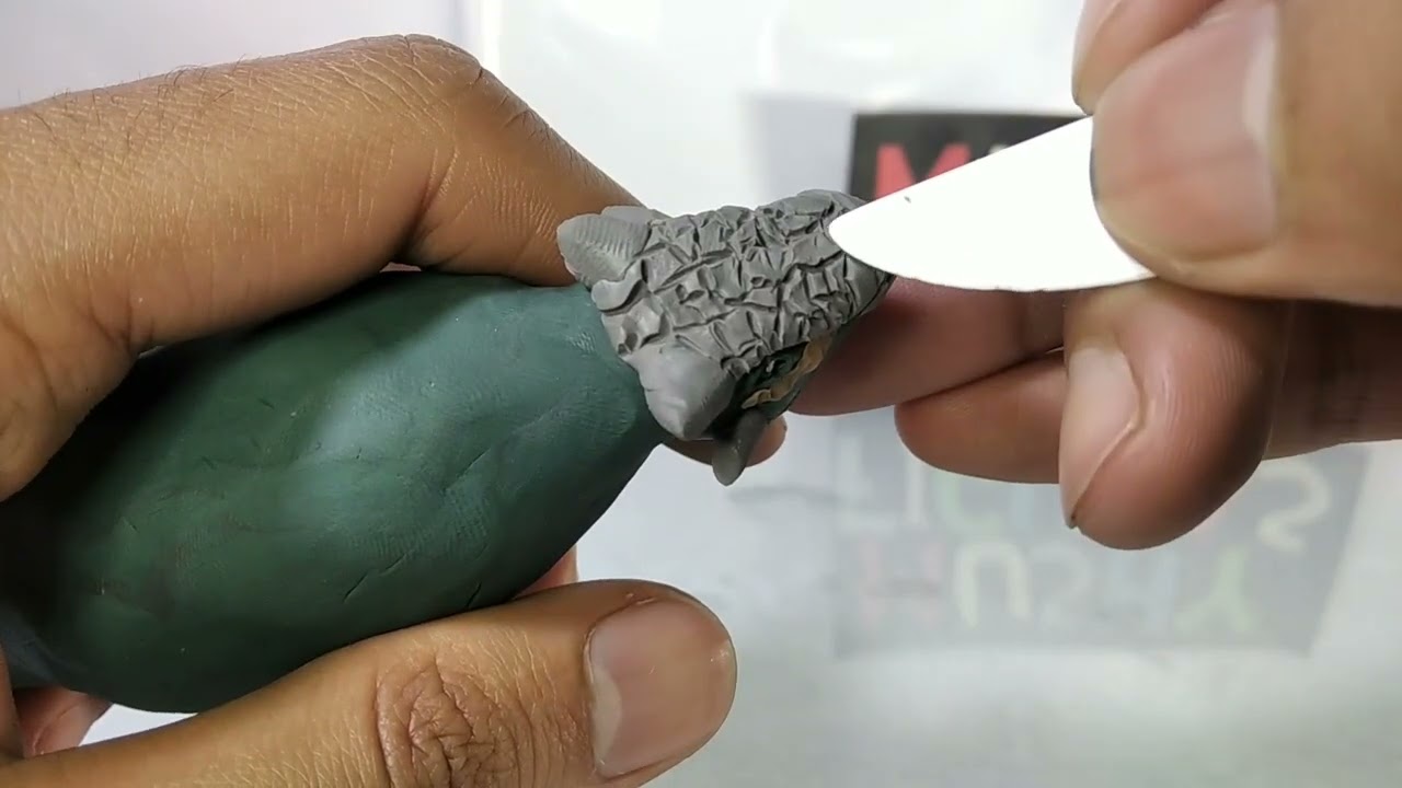 Dracopelta de plastilina/How to make a Dracopelta with clay sculpting 