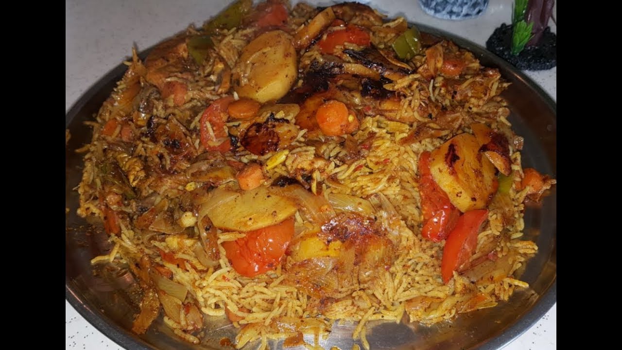 مقلوبة الدجاج بالبابريكا ( من مطبخ ام عمار للأكلات العراقية )