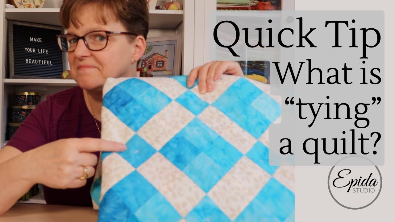 What is "tying" a quilt?